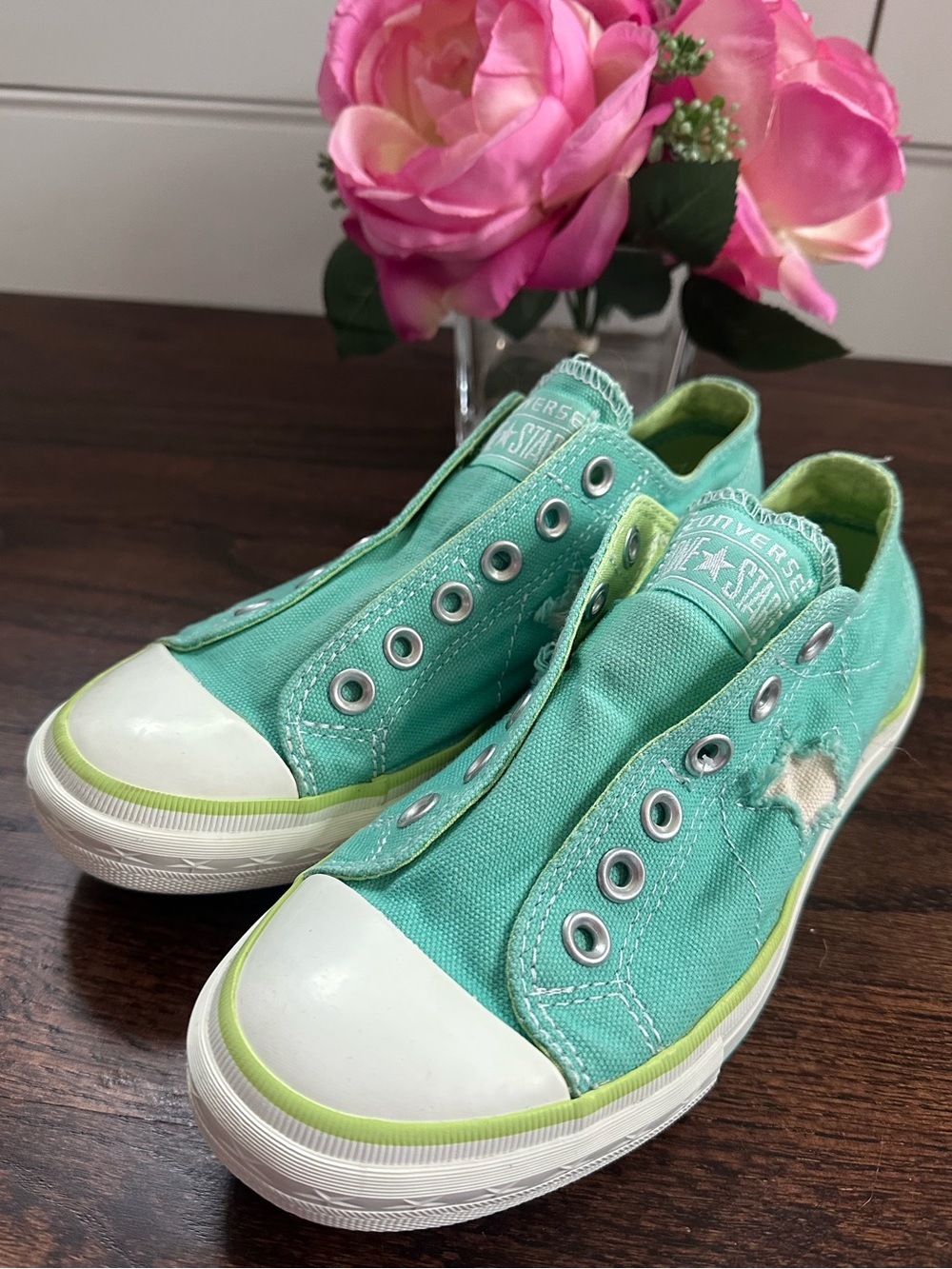 Converse All Stars slip on sneakers, size 7